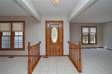Front entry with ceramic tiled floors.