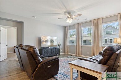 Living room with back yard view