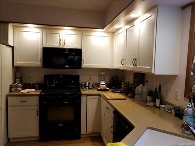 canned lighting and corian countertops