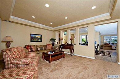 Living room is open to the kitchen and breakfast n
