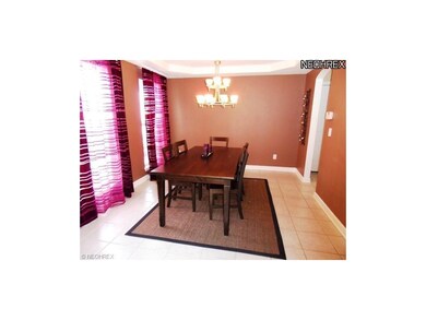 Formal dining room featuring ceramic tile     floo