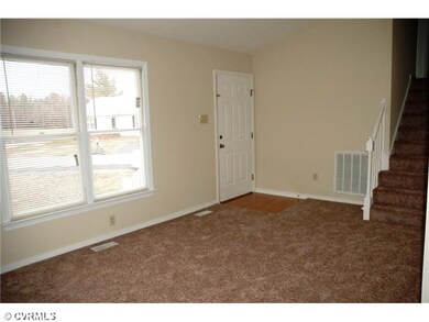 Foyer - Entrance with wood laminate floor and sunn