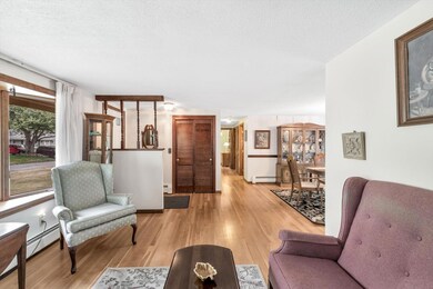 Living toward hall & dining