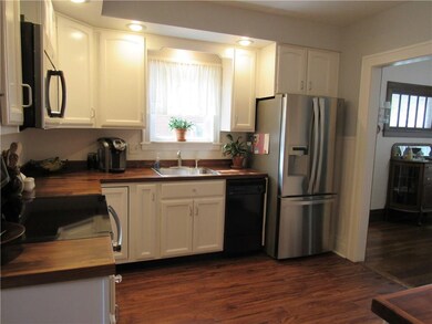 Fullu Applianced modern kitchen with Walnut Counte