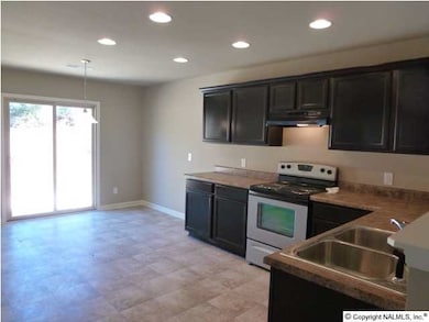 Great Open Kitchen with recessed lights, bartop for entertaining, and spacious eat-in area