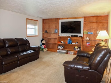 Family room with built-in shelves.