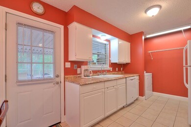 Freshly painted Kitchen with Granite Counter tops.