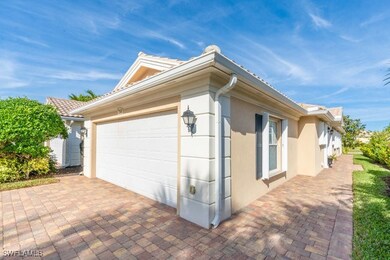 View of property exterior featuring a garage