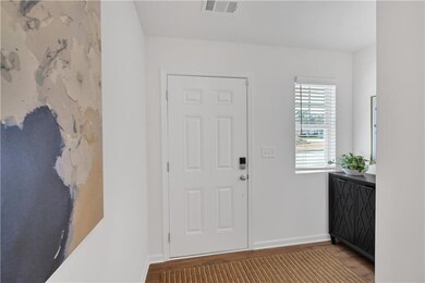 Foyer with wood finished floors