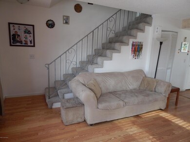 Stairs leading two second floor & bdrms