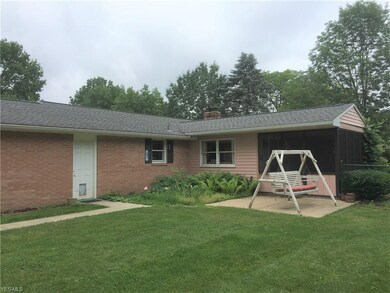 Patio off of the Screened in Porch. Great for Bar-