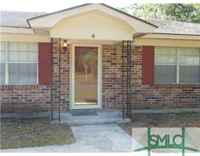 Exterior Front. Covered Porch to Entry Door