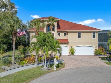Mediterranean / spanish-style house with a garage