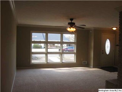 Front living room is light, bright and open.