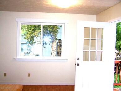 Dining rom with door to rear deck