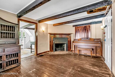 Living/Flex Area - wood door to kitchen