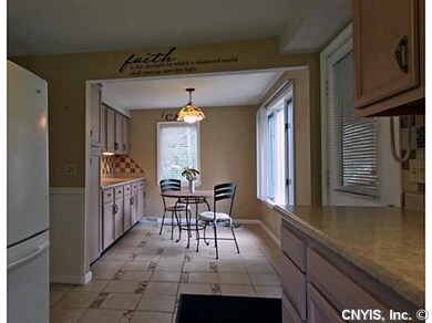 Kitchen Kitchen features custom cabinets