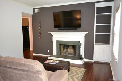 The living space features a wood burning fireplace