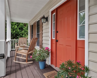 Property entrance featuring covered porch