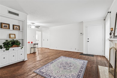 Entry opens into living room and adjoining dining 