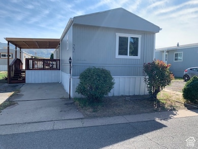 View of front of house featuring a fully covered front porch/deck.