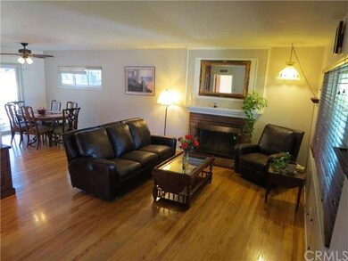 Living Room, open to the Dining Area - wood burnin