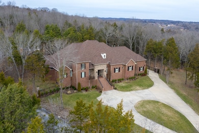 Stately home with all the amenities offered in a park like setting. 