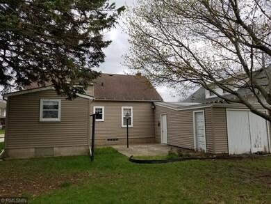 Back of house, side door to garage, back patio
