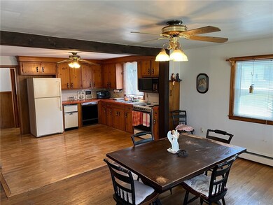 Dining to kitchen from front door