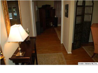 Hardwood floors and neutral colors welcome you int