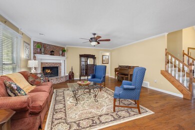 Living room with hardwood / wood-style floors, cei