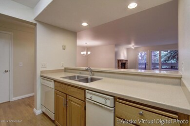 Kitchen opens to living areas . . .