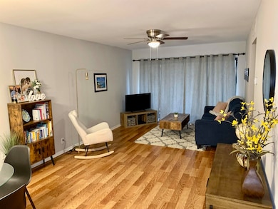 Living room featuring wood-type flooring and ceili