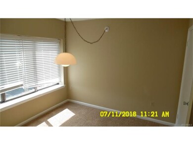 Kitchen Eating Area With New Carpet and Paint