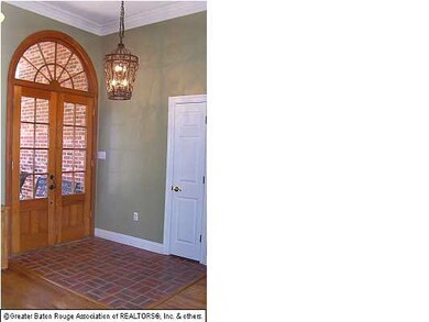 Cypress French Doors into Foyer Area