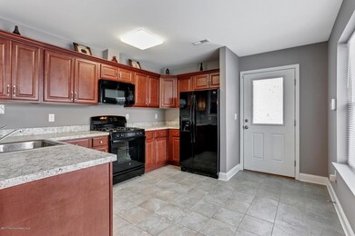 Eat in Kitchen w/Cherry Finished Cab