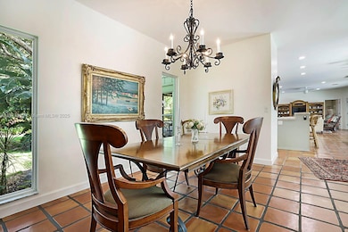 Garden and pool views from your Dining Room