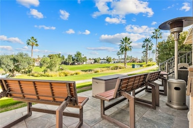 View of patio featuring view of golf course