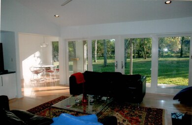 Finished remodel BEFORE FLOOD.  View from Family room into expansive back yard
