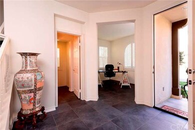 Enter your front door into your large entry with a
