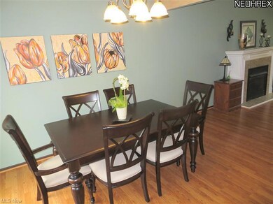 Formal Dining Rm w/Gleaming Laminated Wood Floors.