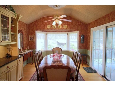Dining Room with views to Lanai and Back Yard.