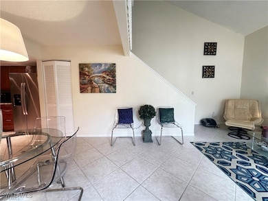 Sitting room featuring light tile patterned floors