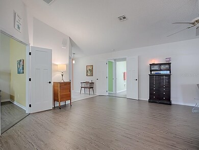 The guest suite and den/office are off the great room.