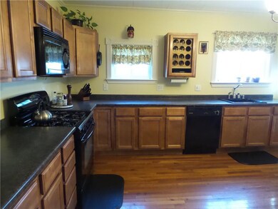 oversized kitchen with shiny real...