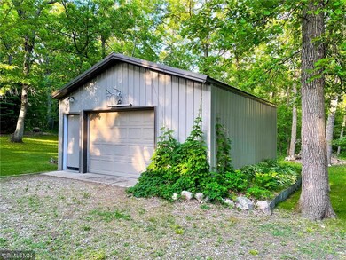 The property includes a detached oversized garage 