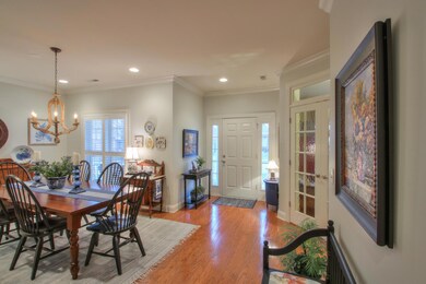 From the front porch, enter this warm, welcoming home through the foyer which opens to the dining room. Just off of the foyer is an office with double doors.