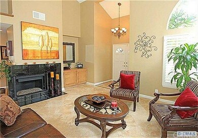 Living room with fireplace, off entry