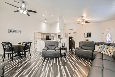 View of Family Room, Dining Area and Front Entry