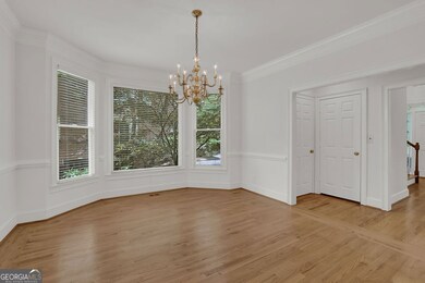 Site finished oak hardwood flooring throughout main level areas.  Elevator access to all 3 levels.  Wet Bar in cabinet.